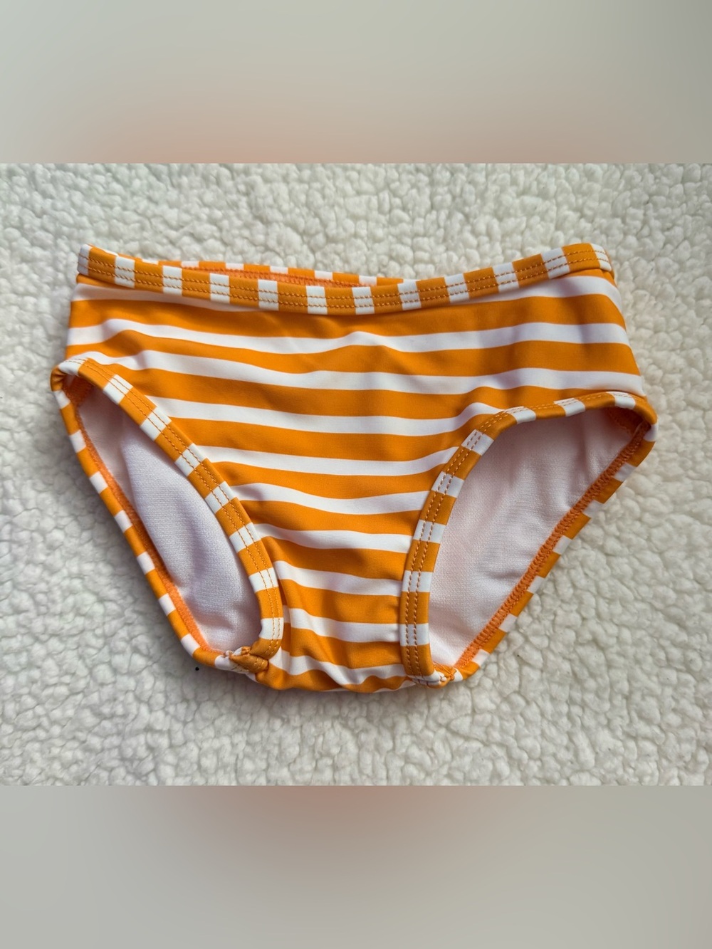 Ruffle Butts Kids Orange and White Stripe Swim Briefs. Size 3-6 months